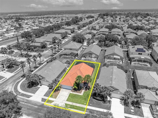 aerial view of residential area with property parcel outlined