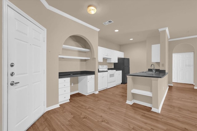 kitchen featuring open shelves, white electric stove, ornamental molding, dark countertops, and freestanding refrigerator