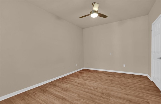 unfurnished bedroom featuring light wood-style flooring, baseboards, and ceiling fan
