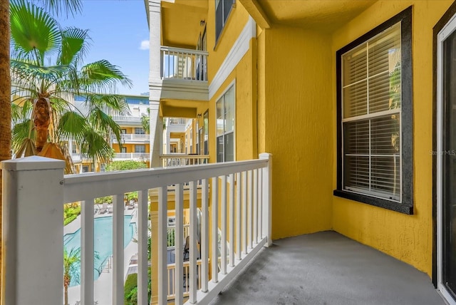 balcony with view of pool area
