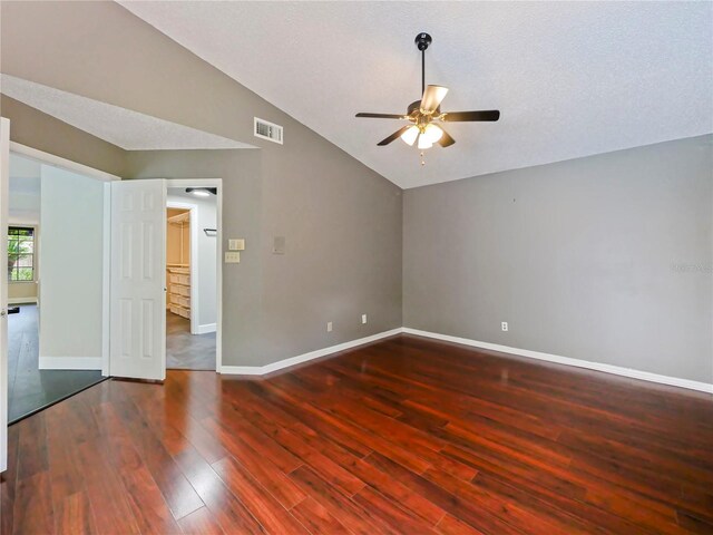 208 Frinton Cv, Longwood, FL 32779 - empty room with vaulted ceiling, a ceiling fan, wood finished floors, and baseboards