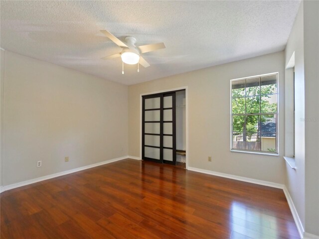 208 Frinton Cv, Longwood, FL 32779 - empty room featuring wood finished floors, ceiling fan, a textured ceiling, and baseboards