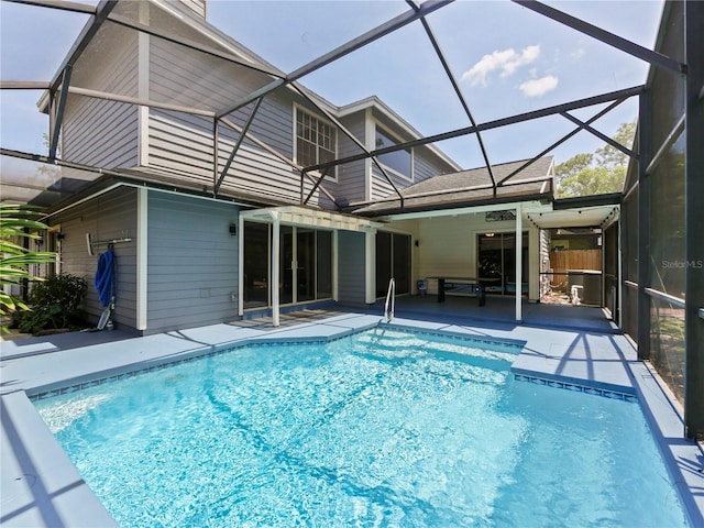 208 Frinton Cv, Longwood, FL 32779 - rear view of house featuring a patio, glass enclosure, and an outdoor pool