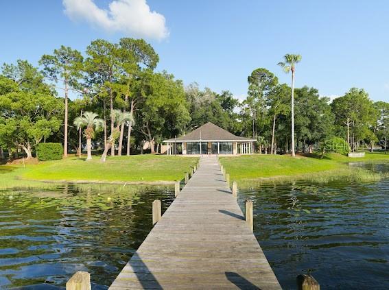 208 Frinton Cv, Longwood, FL 32779 - dock featuring a water view and a gazebo