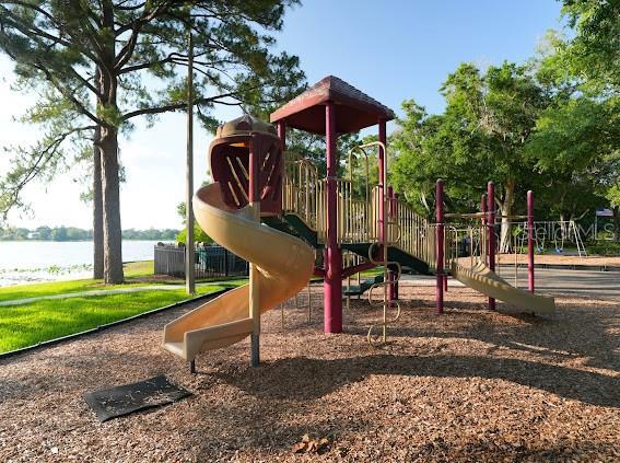 208 Frinton Cv, Longwood, FL 32779 - communal playground featuring a water view