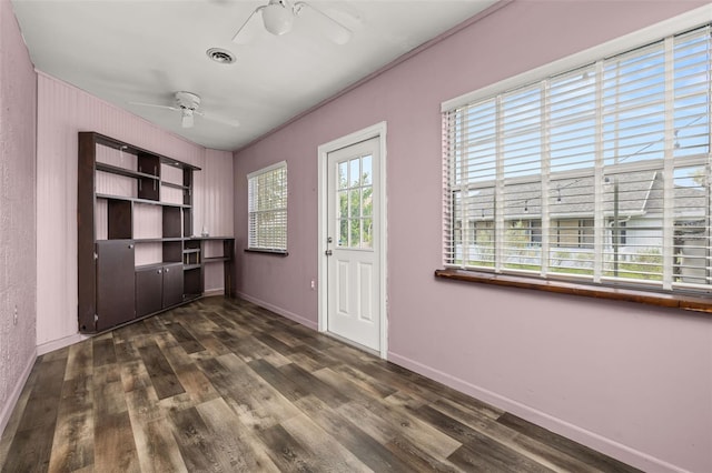 11811 Scarecrow Ln, Orlando, FL 32821 - unfurnished office featuring ceiling fan, baseboards, and wood finished floors
