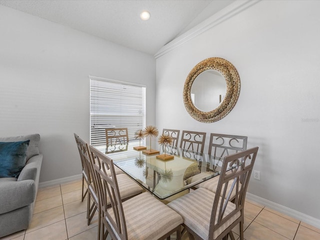 2115 Morning Star Dr, Clermont, FL 34714 - dining room with lofted ceiling, light tile patterned flooring, baseboards, and recessed lighting