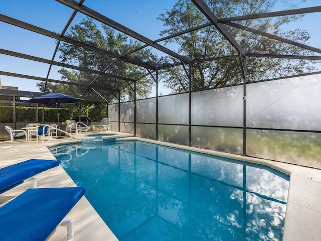 2115 Morning Star Dr, Clermont, FL 34714 - view of pool featuring a patio, a lanai, and a pool with connected hot tub