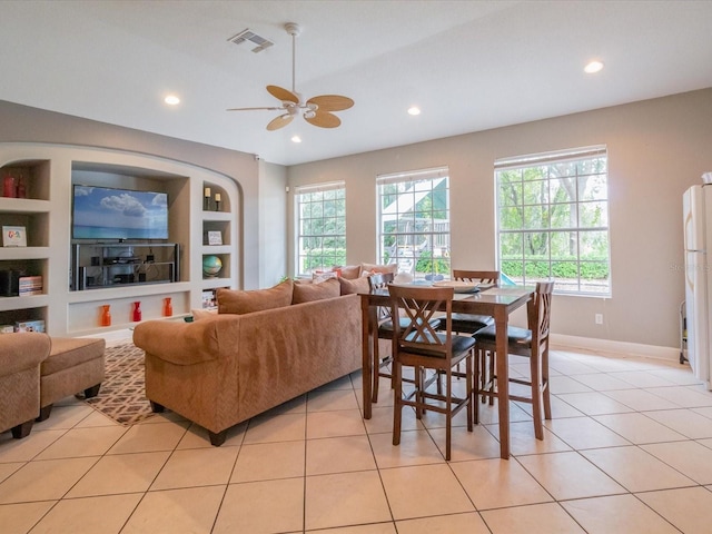 2115 Morning Star Dr, Clermont, FL 34714 - living area featuring healthy amount of natural light, recessed lighting, built in features, a ceiling fan, and baseboards