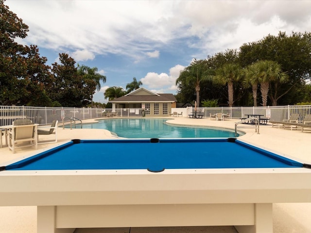 2115 Morning Star Dr, Clermont, FL 34714 - community pool with a patio area