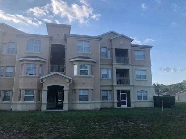 view of front of house featuring stucco siding