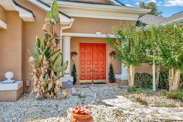 14680 Linden Dr, Spring Hill, FL 34609 - view of exterior entry with stucco siding