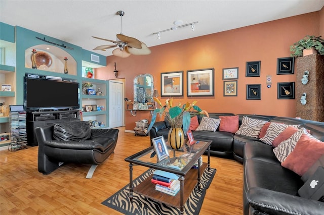 14680 Linden Dr, Spring Hill, FL 34609 - living area featuring a ceiling fan and light wood finished floors