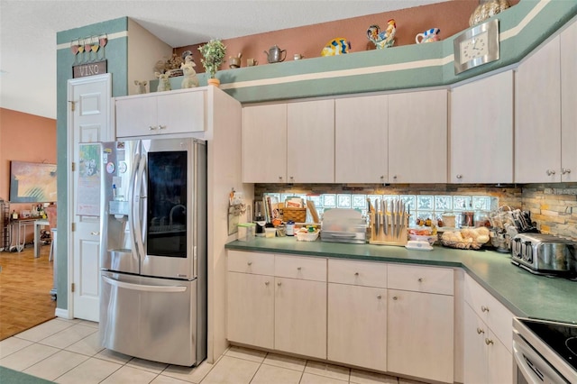 14680 Linden Dr, Spring Hill, FL 34609 - kitchen with stainless steel appliances, backsplash, and light tile patterned floors
