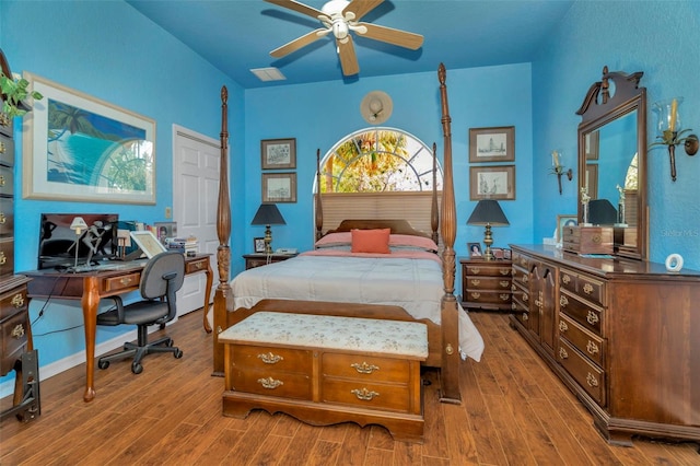 14680 Linden Dr, Spring Hill, FL 34609 - bedroom with wood finished floors, a desk, and a ceiling fan