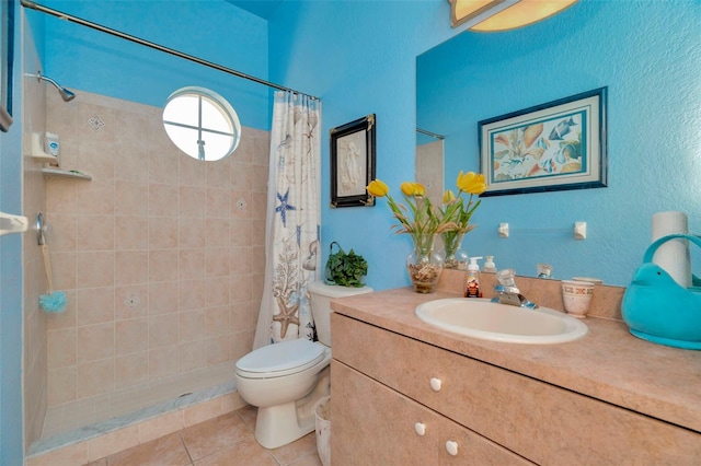 14680 Linden Dr, Spring Hill, FL 34609 - full bathroom featuring a tile shower, toilet, vanity, and tile patterned flooring