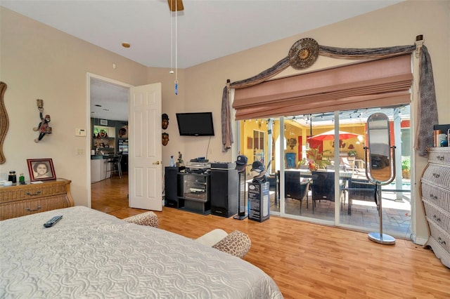 14680 Linden Dr, Spring Hill, FL 34609 - bedroom featuring access to outside and wood finished floors