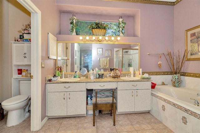 14680 Linden Dr, Spring Hill, FL 34609 - full bath featuring a shower stall, a garden tub, toilet, double vanity, and tile patterned floors