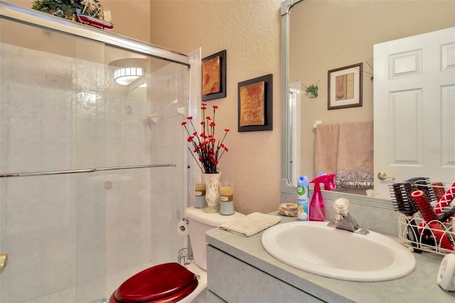 14680 Linden Dr, Spring Hill, FL 34609 - full bathroom featuring a textured wall, a shower stall, toilet, and vanity