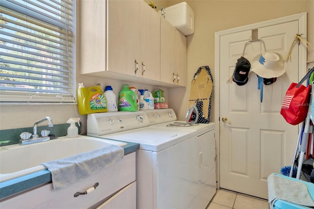 14680 Linden Dr, Spring Hill, FL 34609 - laundry room with cabinet space, independent washer and dryer, and light tile patterned floors