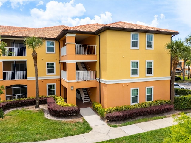 5447 Vineland Rd Unit 1308, Orlando, FL 32811 - view of building exterior with stairway