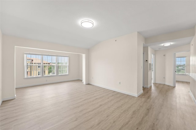 5447 Vineland Rd Unit 1308, Orlando, FL 32811 - spare room with light wood-style floors and baseboards