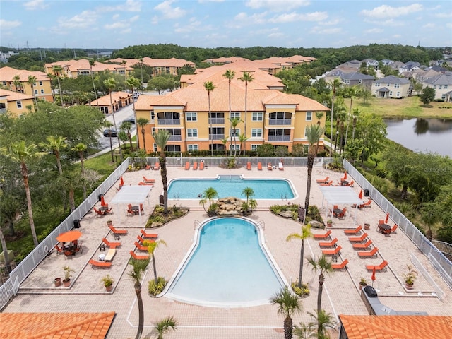 5447 Vineland Rd Unit 1308, Orlando, FL 32811 - community pool with a residential view
