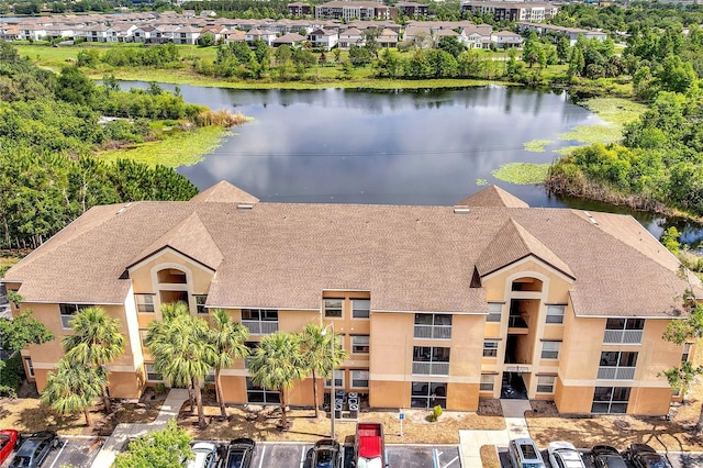 view of subject property with a large body of water