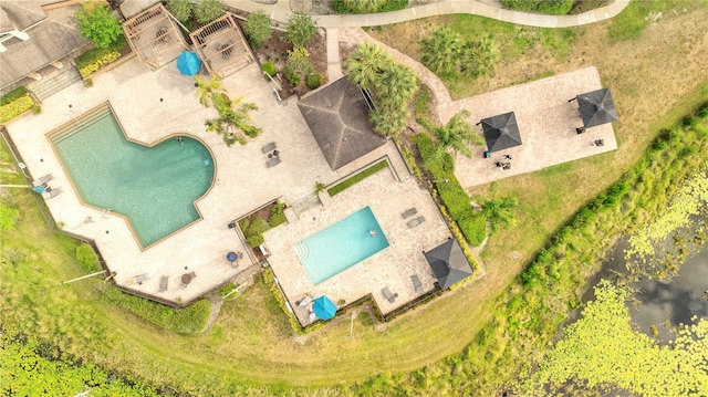 drone / aerial view of a pool area