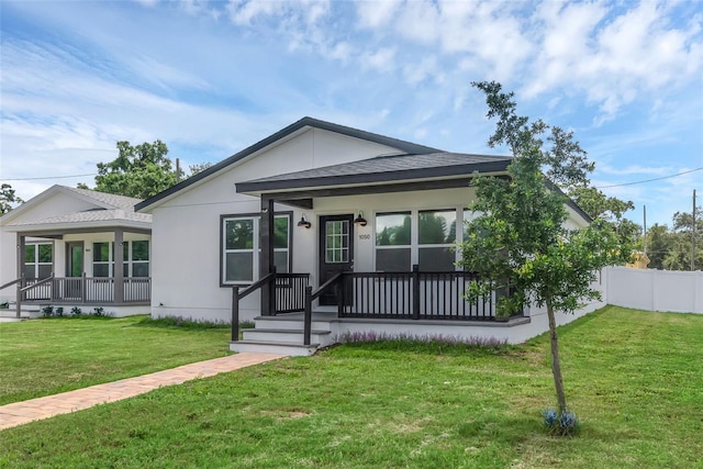 1050 20th St, Orlando, FL 32805 - view of front of property featuring covered porch and roof with shingles