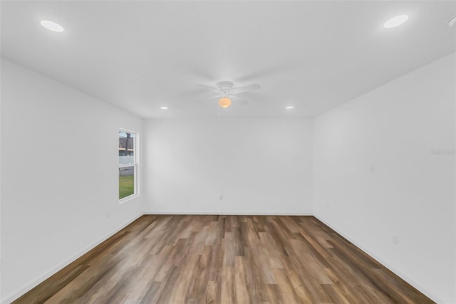 1050 20th St, Orlando, FL 32805 - unfurnished room featuring wood finished floors, ceiling fan, recessed lighting, and baseboards