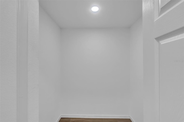 1050 20th St, Orlando, FL 32805 - spare room with dark wood-style floors, baseboards, and recessed lighting