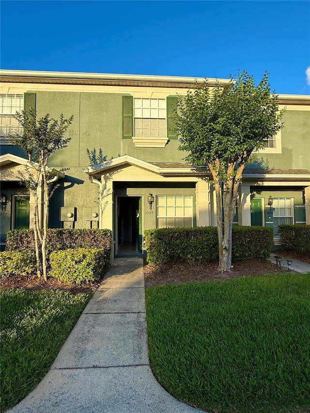view of front of home featuring stucco siding