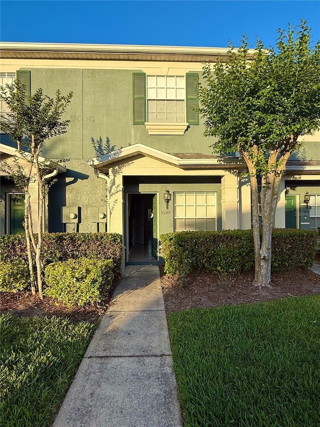view of front facade with stucco siding