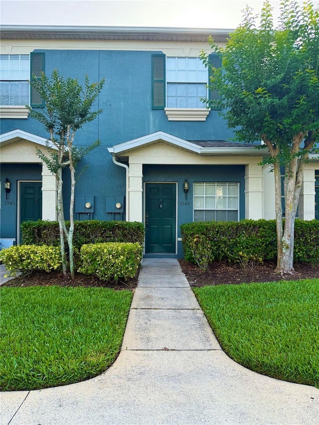 view of front of home featuring stucco siding