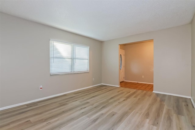 2006 Sycamore Ln, Plant City, FL 33563 - spare room with light wood-style flooring and baseboards