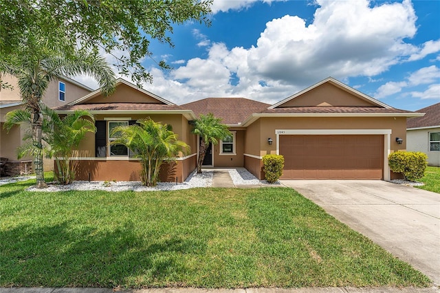 12845 Sawgrass Pine Cir, Orlando, FL 32824 - single story home featuring stucco siding, concrete driveway, a garage, and a front yard