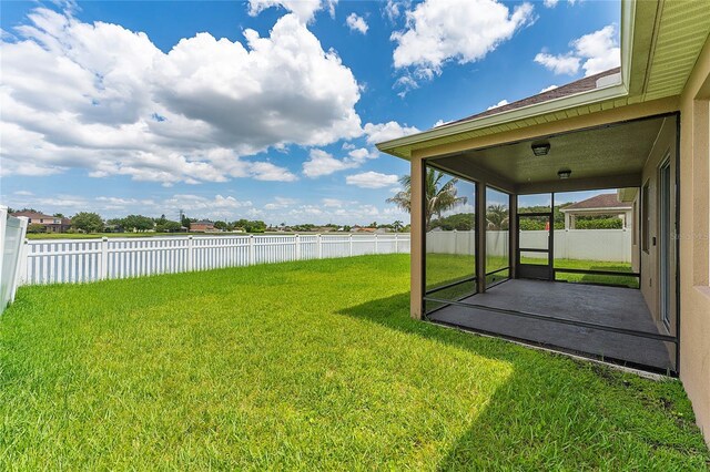 12845 Sawgrass Pine Cir, Orlando, FL 32824 - view of yard with a water view and a sunroom