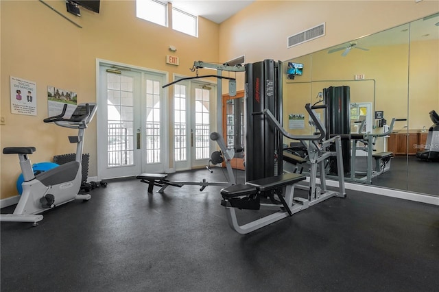 1638 Whitney Isles Dr, Windermere, FL 34786 - gym with a towering ceiling, a ceiling fan, and french doors