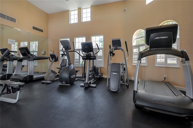 1638 Whitney Isles Dr, Windermere, FL 34786 - workout area with baseboards and a towering ceiling