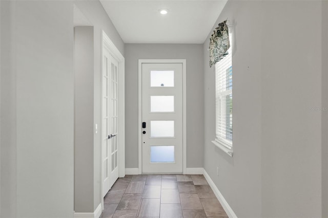 15975 Marina Bay Dr, Winter Garden, FL 34787 - foyer featuring baseboards and recessed lighting