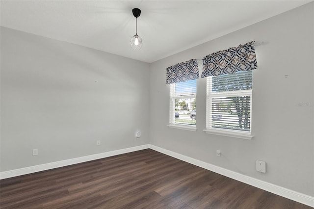 15975 Marina Bay Dr, Winter Garden, FL 34787 - empty room with baseboards and dark wood-style flooring