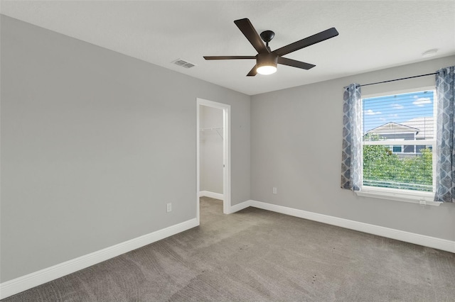 15975 Marina Bay Dr, Winter Garden, FL 34787 - empty room with carpet, baseboards, and a ceiling fan