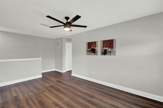 15975 Marina Bay Dr, Winter Garden, FL 34787 - spare room with dark wood-style floors, baseboards, and ceiling fan