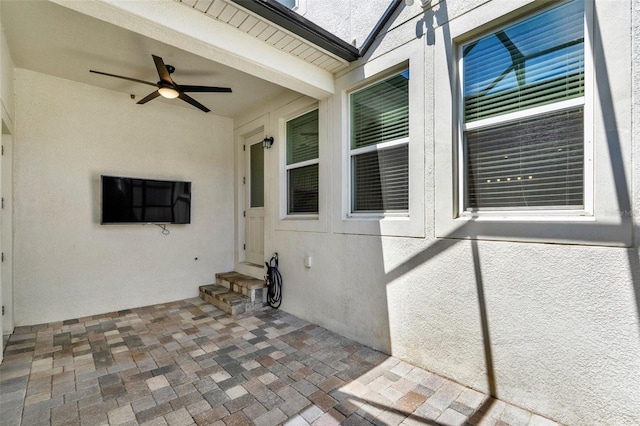 15975 Marina Bay Dr, Winter Garden, FL 34787 - view of patio featuring a ceiling fan and entry steps