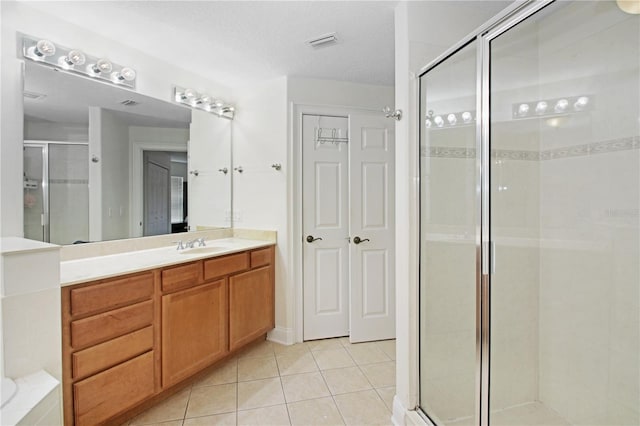 6941 Piazza St, Orlando, FL 32819 - full bath with a stall shower, tile patterned flooring, vanity, and a tub