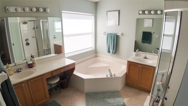 2343 Walnut Heights Rd, Apopka, FL 32703 - full bath with a shower stall, tile patterned floors, a bath, and two vanities