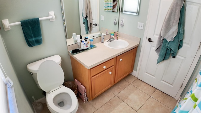 2343 Walnut Heights Rd, Apopka, FL 32703 - bathroom featuring tile patterned flooring, toilet, and vanity