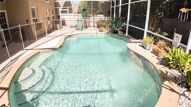 2343 Walnut Heights Rd, Apopka, FL 32703 - view of swimming pool with fence, a patio area, and a lanai