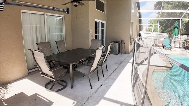 2343 Walnut Heights Rd, Apopka, FL 32703 - view of patio featuring a ceiling fan, an outdoor pool, fence, and outdoor dining space